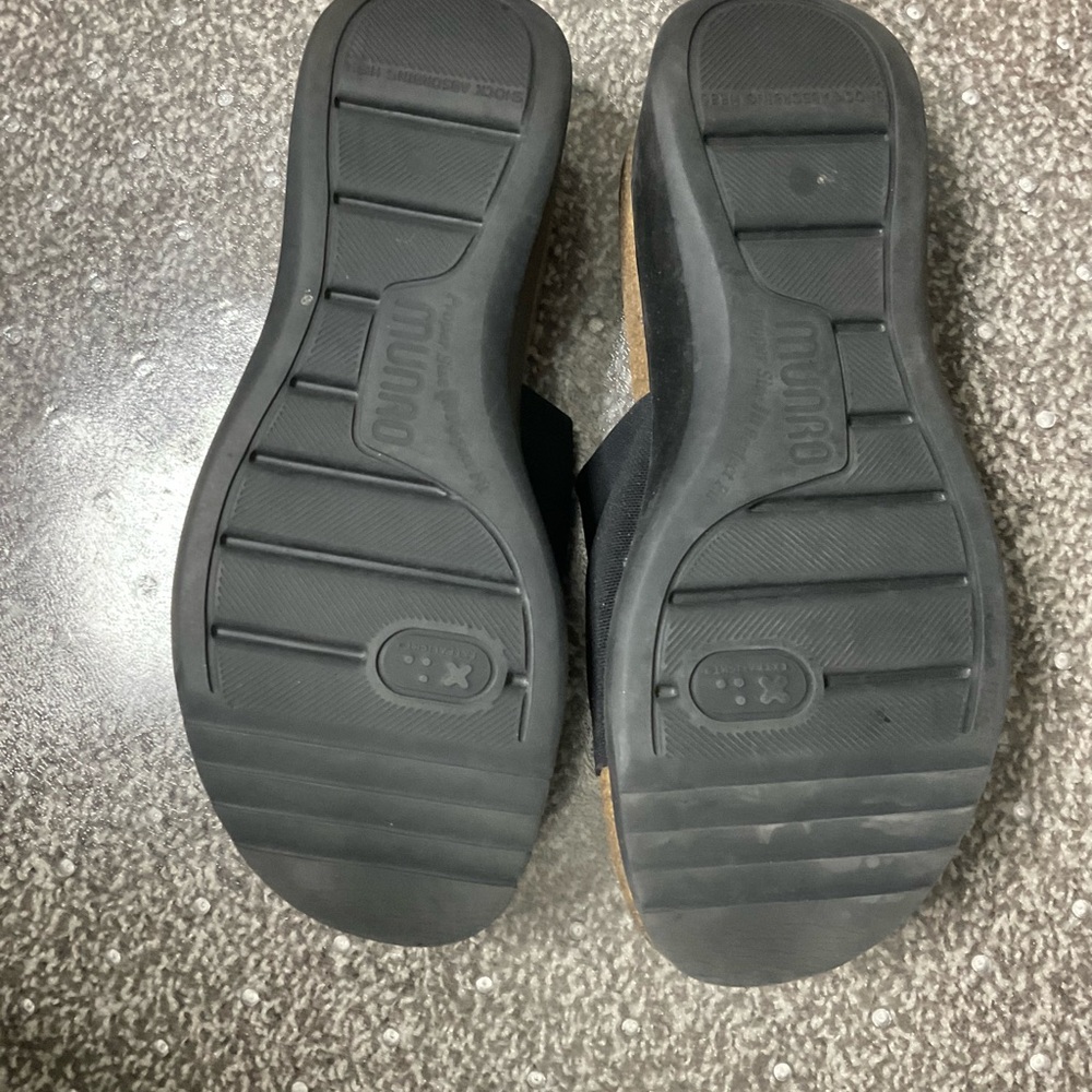 MUNRO slides 
Size 6 black stretchy thick fabric